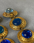 Golden blue round dangly clips 250