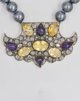 Elegant pearl necklace with a shiny pendant