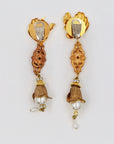 Mismatched pearly clips