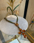 Orange and green glass long cross necklace
