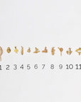 Playful gold-plated pendant (and gift chain)