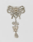 « Ugo Correani » bow silvery shiny brooch