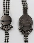 "Regina Schrecker" long necklace with brooches