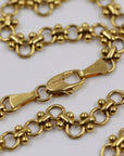 70s "Fabi" red pendant with a "Cascio" golden chain