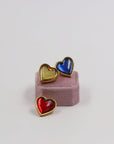 Yves Saint Laurent blue, red and yellow pins