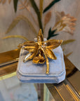 Golden shiny christmas flower brooch