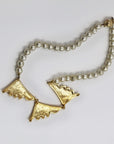 Pearly and golden necklace