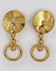 Golden round clips earrings