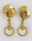 Golden round clips earrings