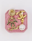 Mismatched Chanel earrings (pierced ears)
