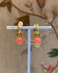 Golden and orange dangly small hoops
