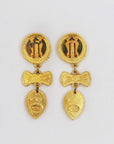 "Jacky de G" golden and red clips