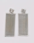 Maximalist silvery shiny dangly earrings