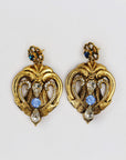 Shiny statement golden earrings