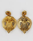 Shiny statement golden earrings