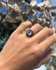 Antique silver and blue topaz solitaire ring