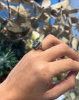 Antique silver and blue topaz solitaire ring