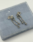 Art deco bow clip-on earrings in silver, 1930