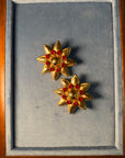 Flower sun golden and red compact clip-on earrings
