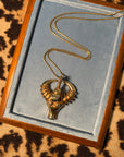 Golden taurus face necklace