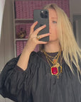 70s "Fabi" red pendant with a "Cascio" golden chain