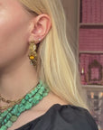 "Mulu Reggio E." baroque oriental golden hoops