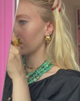"Mulu Reggio E." baroque oriental golden hoops