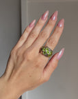 Oversize peridot and silver ring