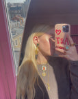 Dangly golden black and white clips