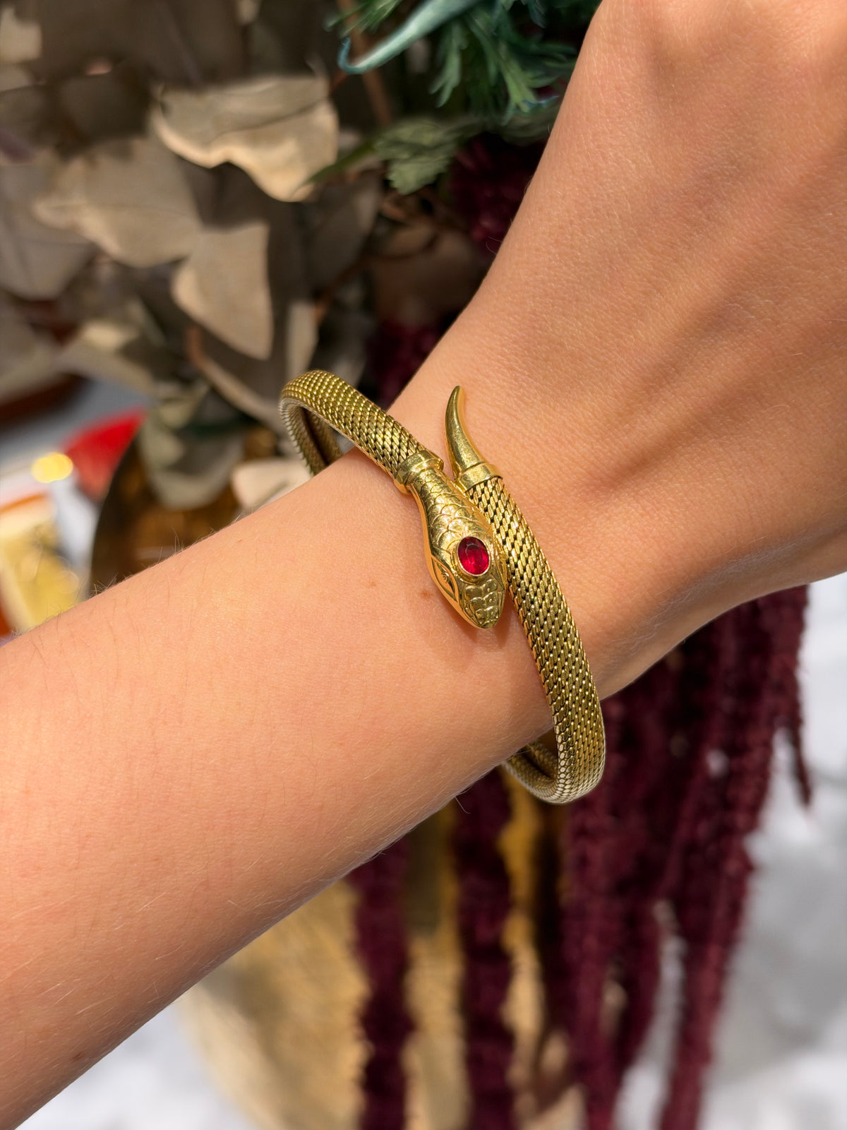 1950s French Gold-Plated Snake Bracelet with Red Glass