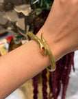 1950s French Gold-Plated Snake Bracelet with Red Glass