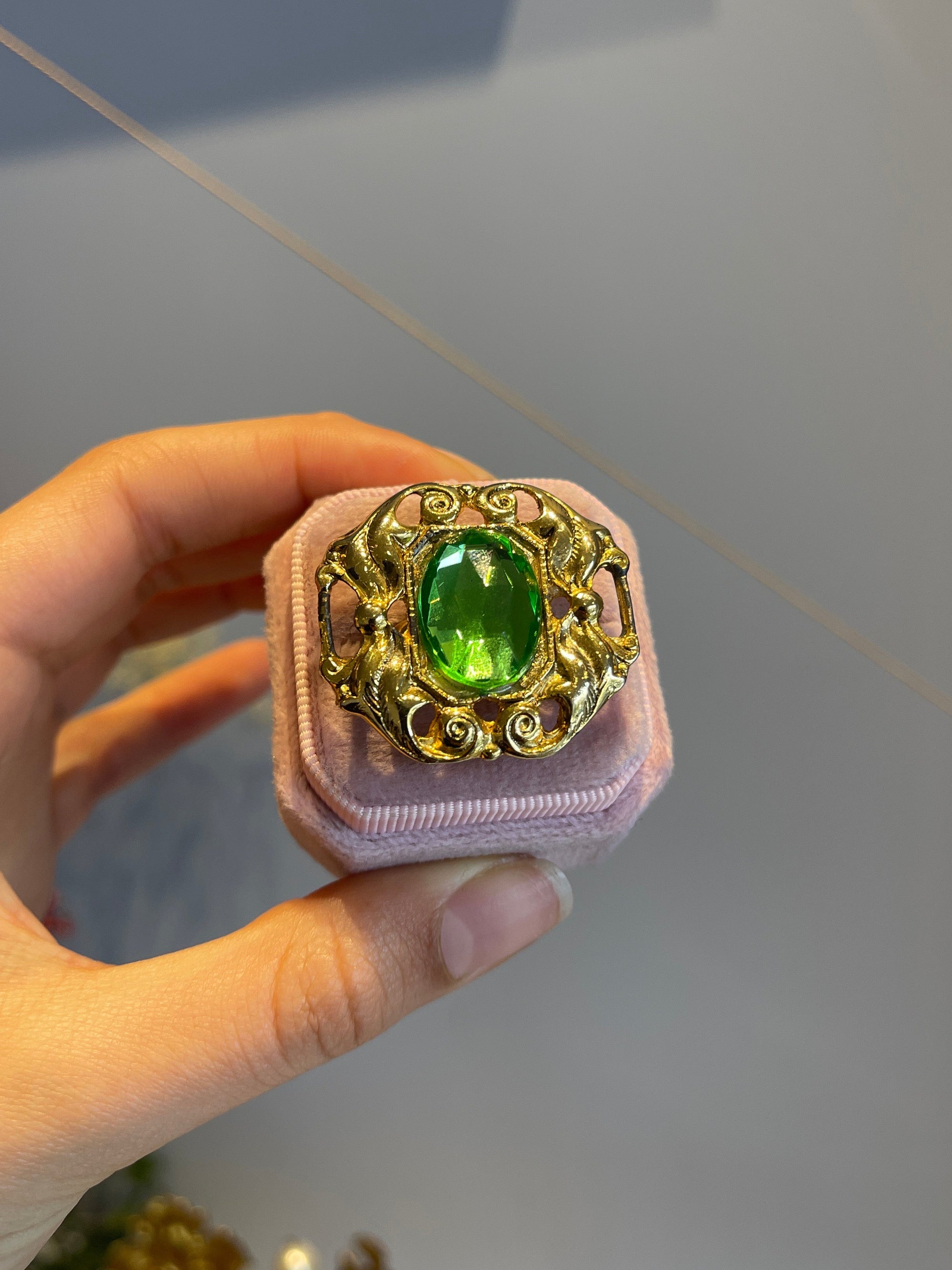 Golden and green adjustable cocktail ring 110