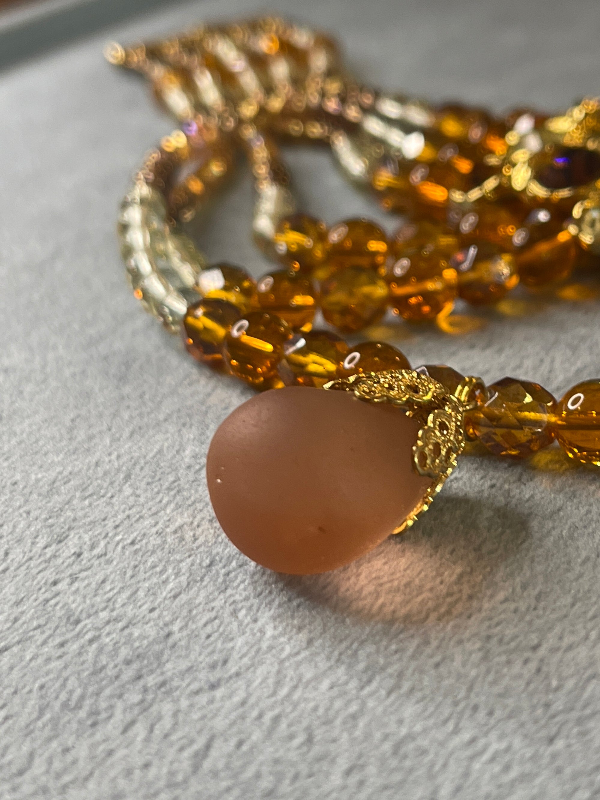 AN pearly amber glass golden mount necklace 410
