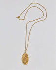 Gold plated and gold "FIX" pendant necklace