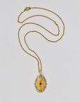 Gold plated "FIX" necklace with a pendant from the 50s