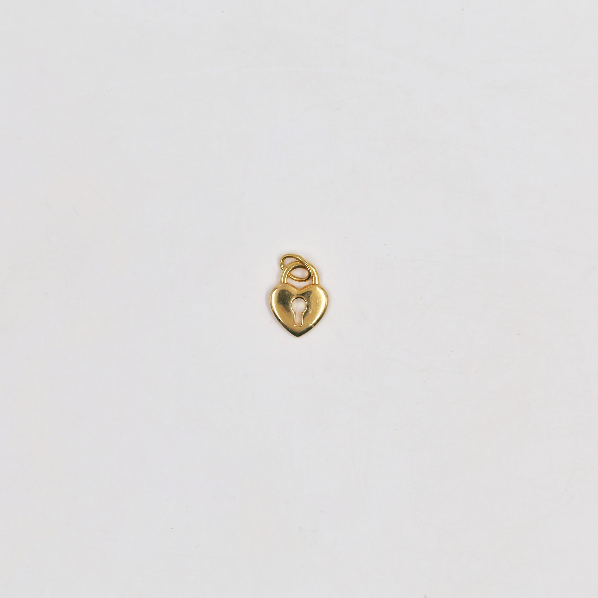 Playful gold-plated pendant (and gift chain)