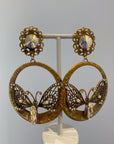 Golden openwork butterfly dangly earrings