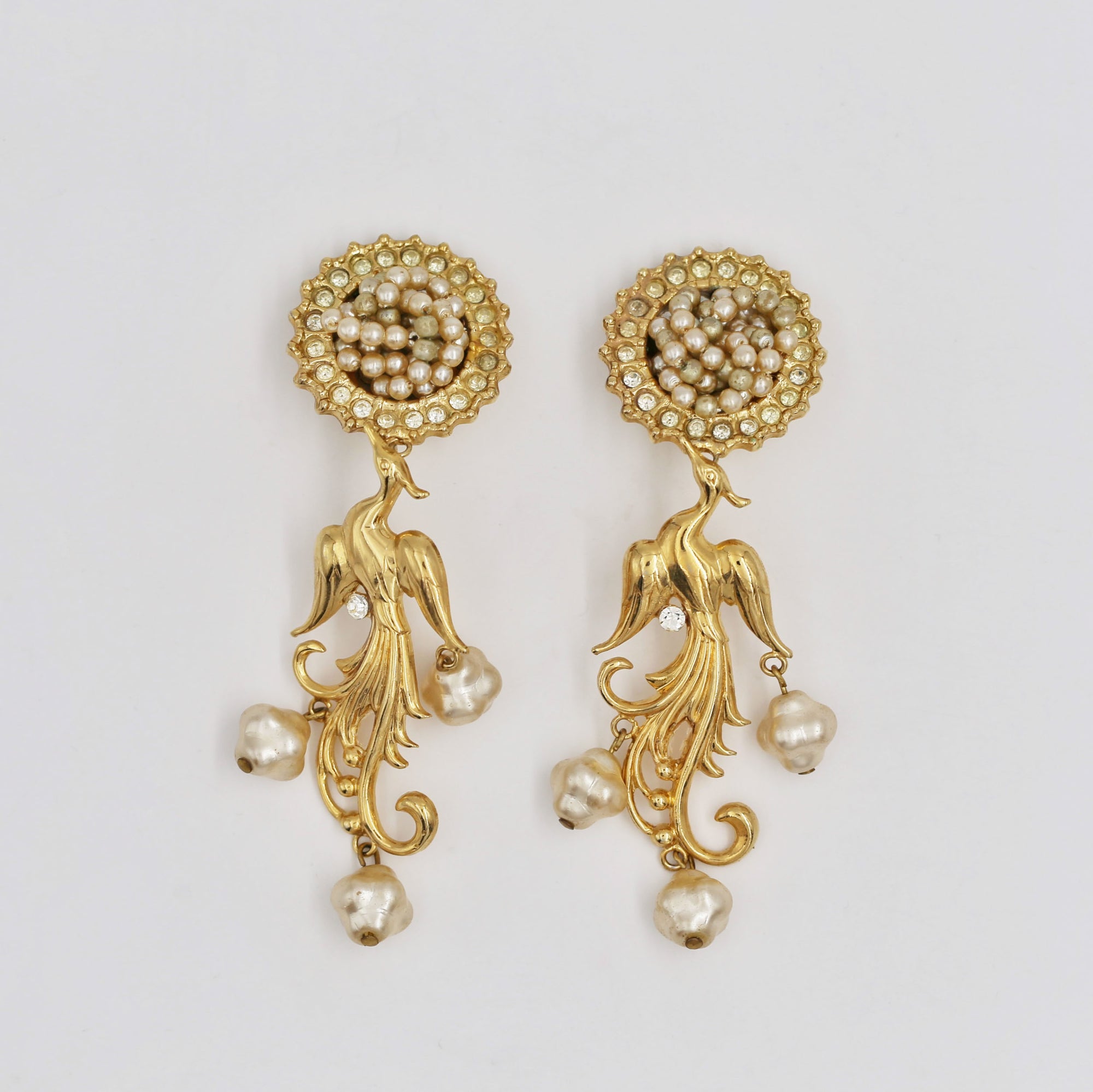 Delicate pearly golden bird clips