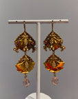 Openwork golden and pink dangly earrings