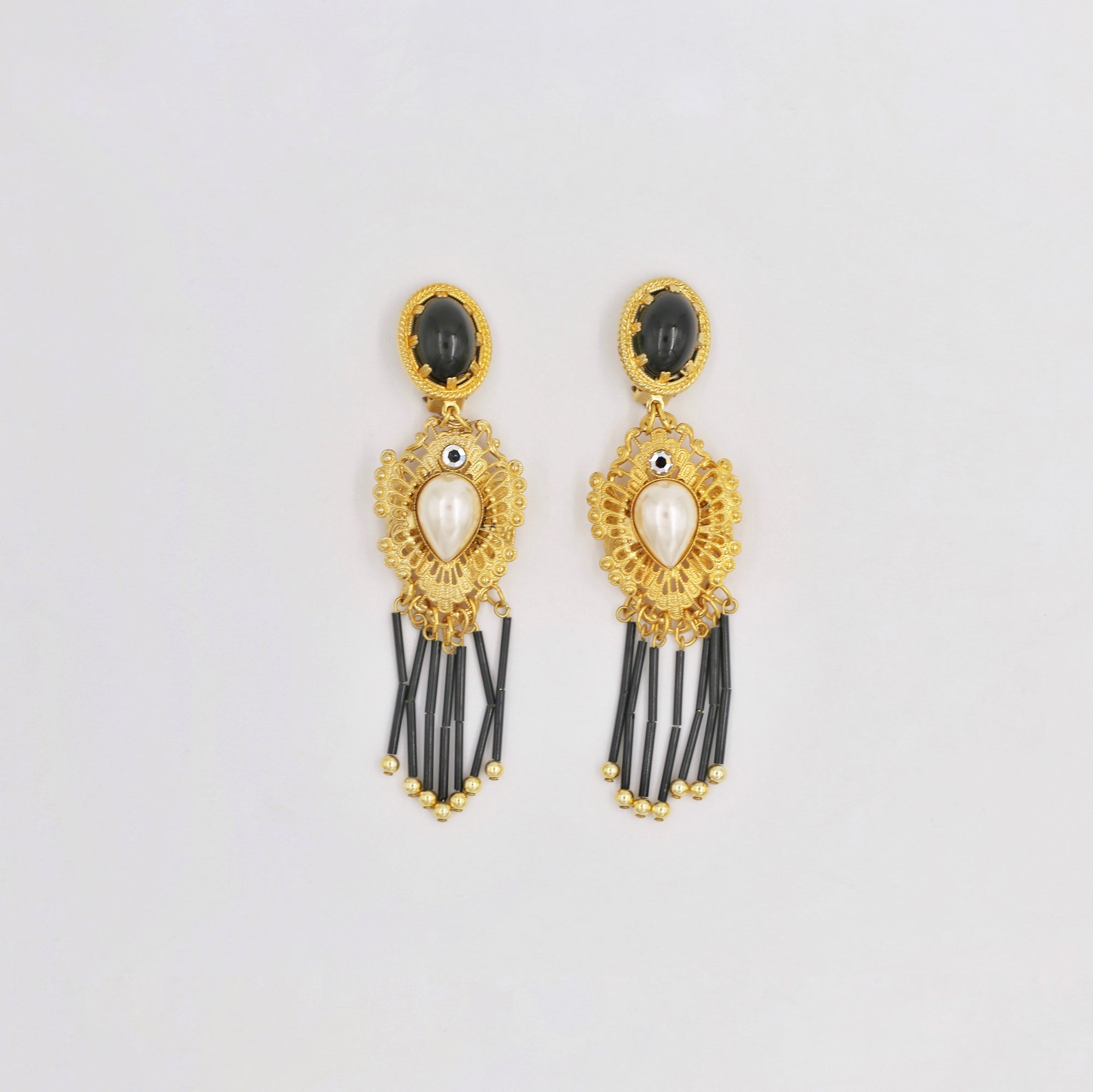 Dangly golden black and white clips