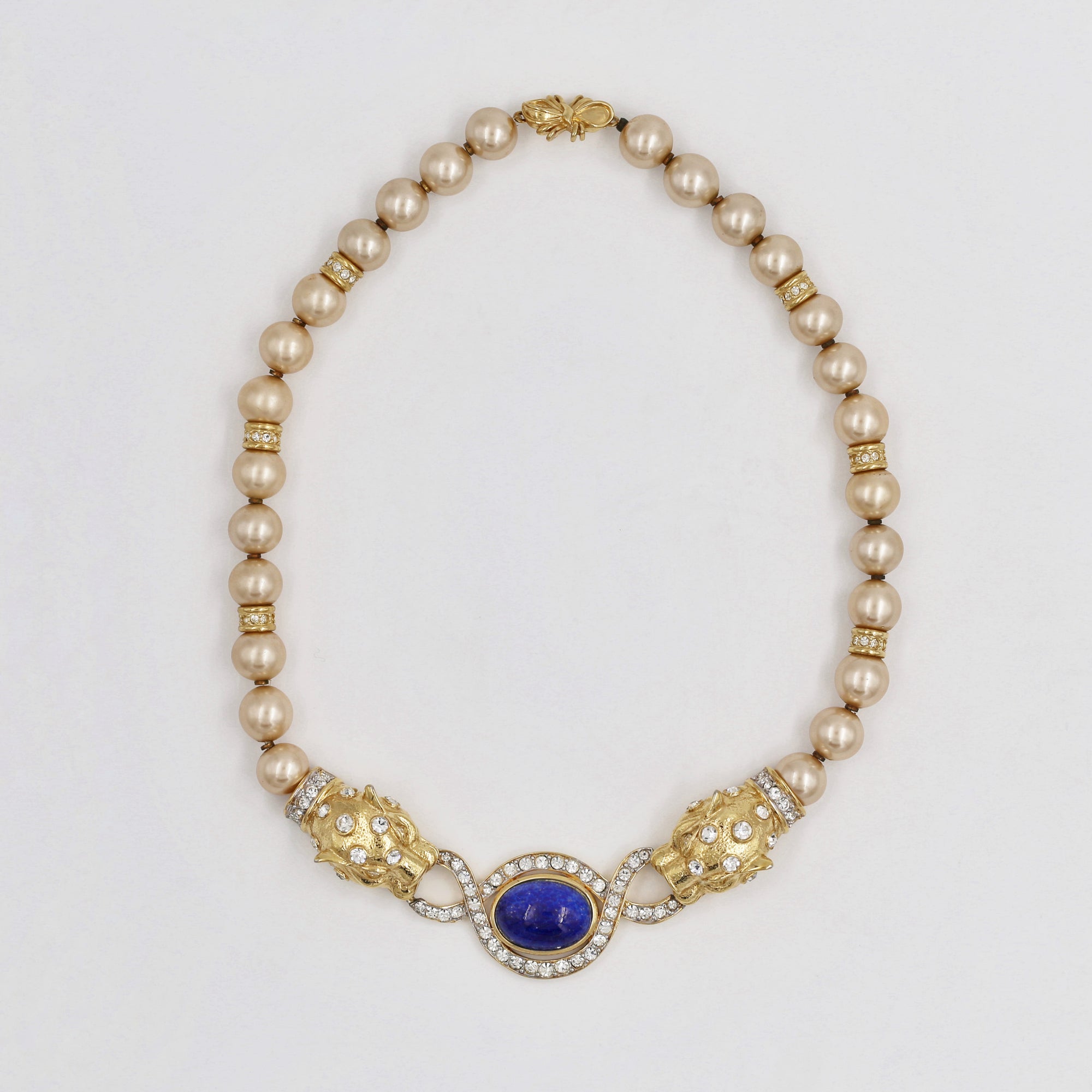 Pearls necklace with golden cheetah