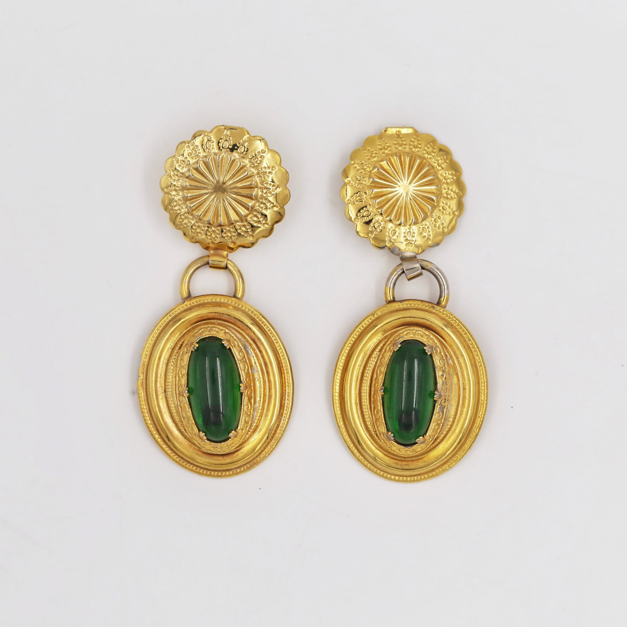 Oversize golden and green clips