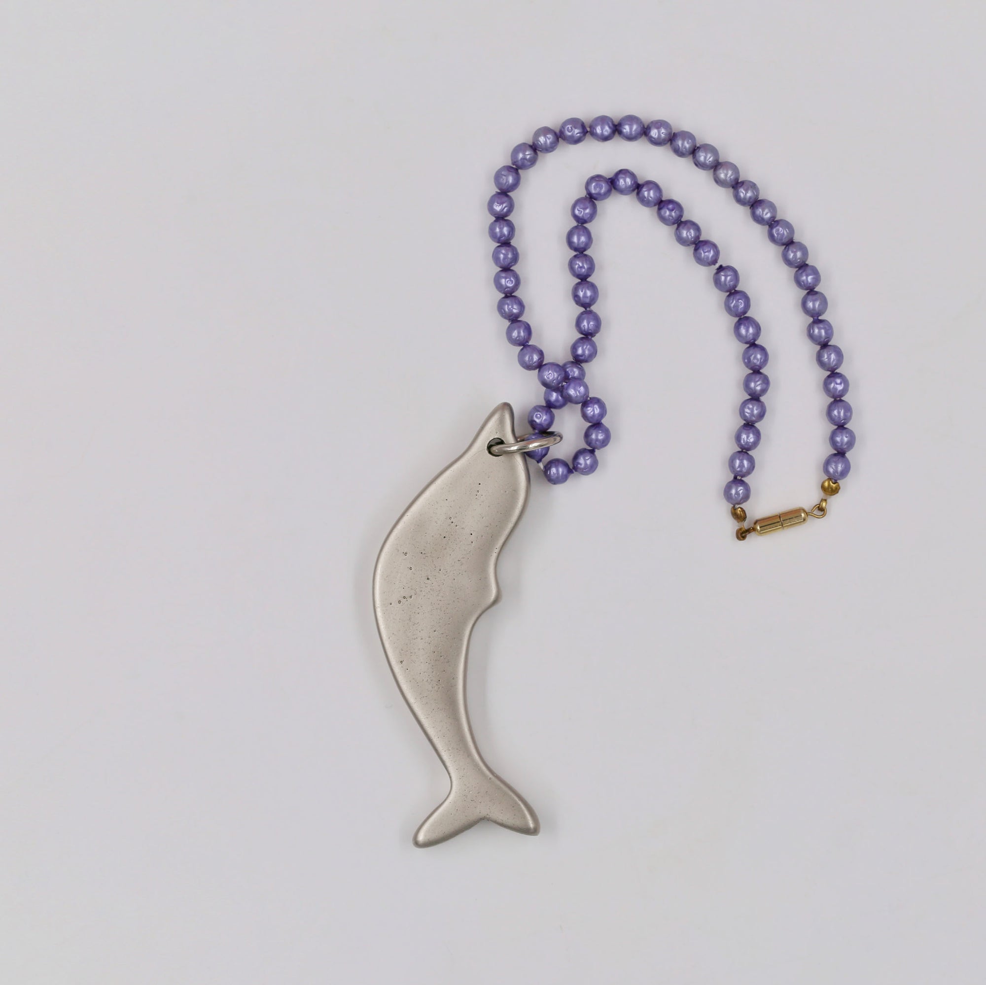 Upcycled dolphin and pearly chain