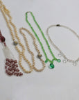 Pearly and glass necklaces from 1920 to 1960