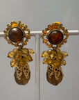 Delicate brown and golden dangly clips