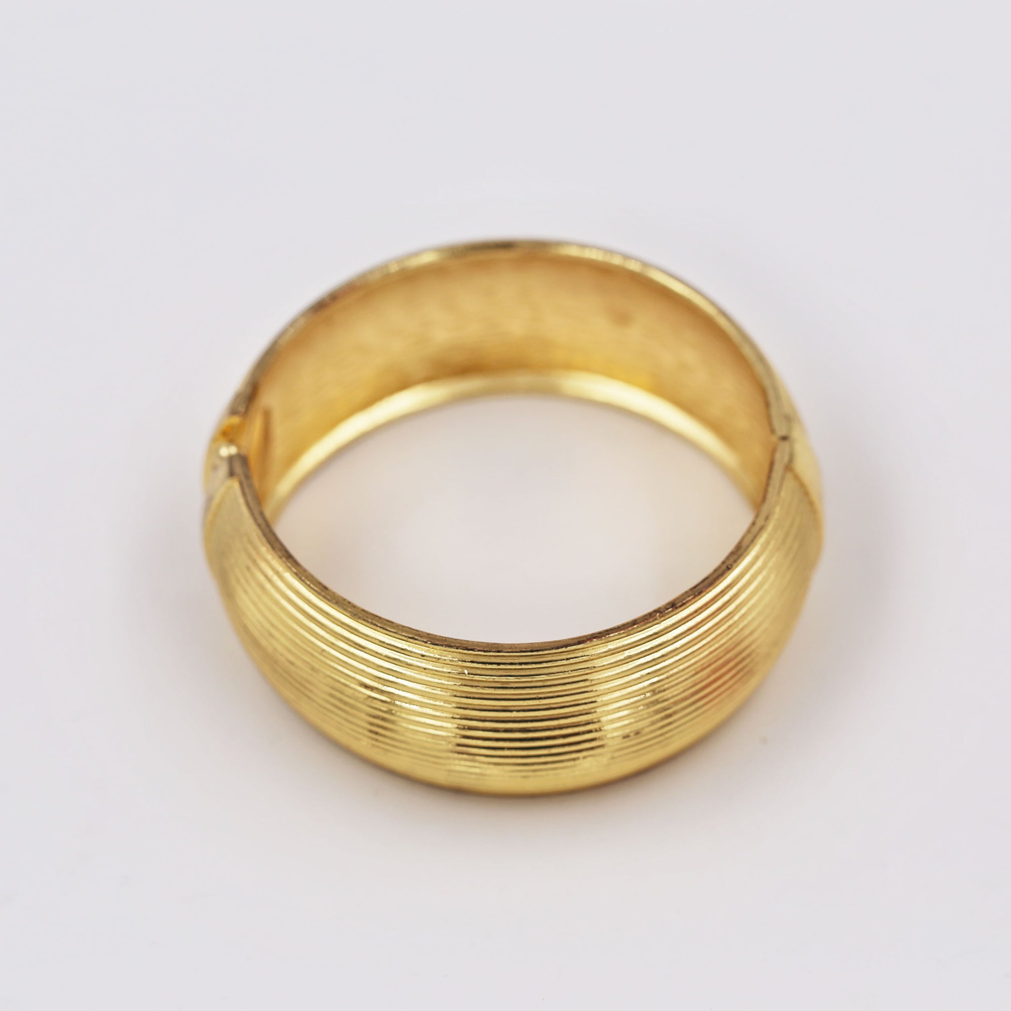 Maximalist golden bangle