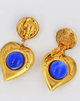 "Yves Saint Laurent - Rive gauche" green and blue golden hearts clip