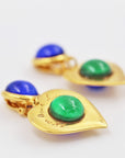 "Yves Saint Laurent - Rive gauche" green and blue golden hearts clip