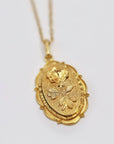 Gold plated and gold "FIX" pendant necklace