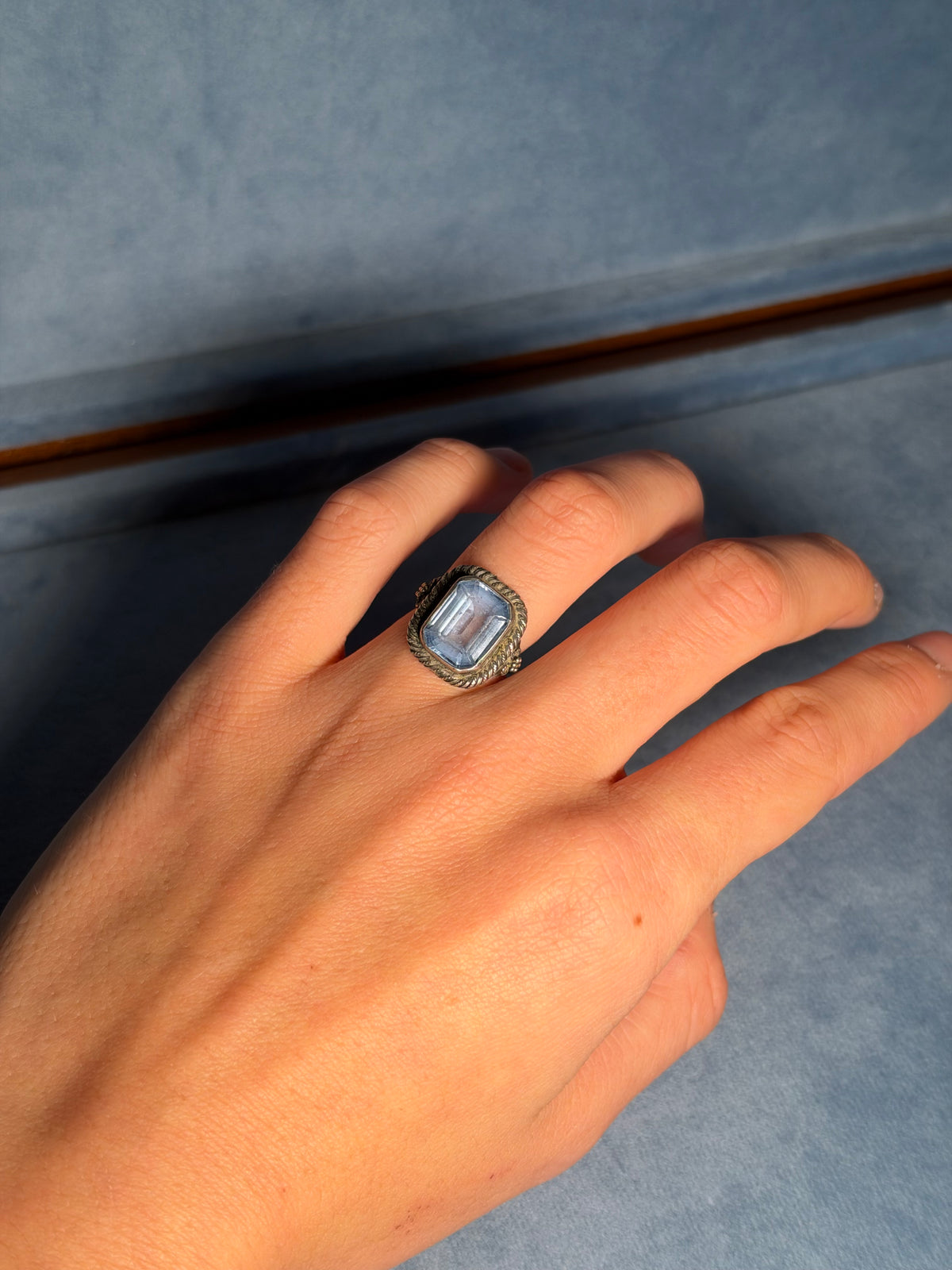 Antique silver and blue topaz solitaire ring